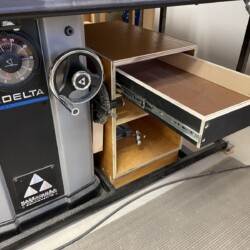 The repurposed drawer slide is from my former desk's pencil drawer