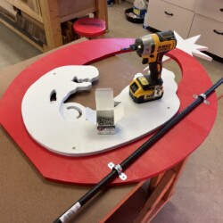 Final assembly of the "O" letters and an example of the 3/4" conduit clamps to hold the letters on the 1/2" round steel concrete forming stakes