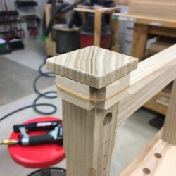 A rubber band and four 5/16 spacers helped position the beveled cap pieces.