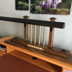 The finished lamp, sitting on the riser at the back of my desk.
