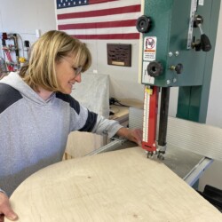 Linda cutting curves on the bandsaw