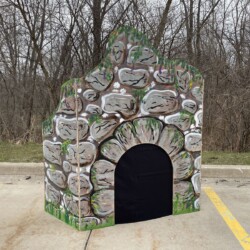 Tomb set up with black fabric to simulate the entrance