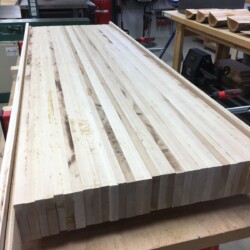 Positioning plywood rails for flattening