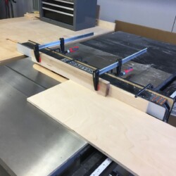 Cutting rabbets on the half-inch door panels to fit in quarter-inch grooves