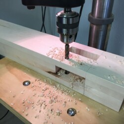 Drilling leg holes in legs on the drill press