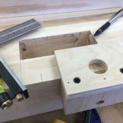 Custom jig for hand drilling peg holes in bench top