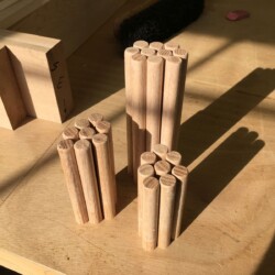 Chamfered, waxed pegs ready for assembly