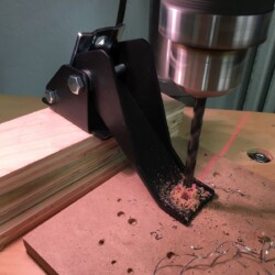 Drilling retractable caster levers for attaching steel tubing