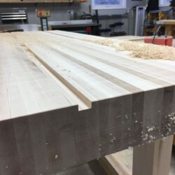 Routed grooves 3/8"+ deep for T-tracks