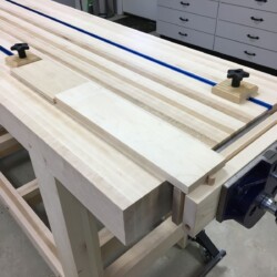 Oak dowel dogs line up with T-tracks