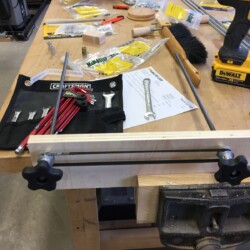 The center-to-center distance looked okay in a mockup, but an updated design should include a belt tensioning feature.