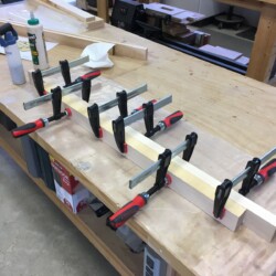 Gluing up hard maple stock for vise jaws.