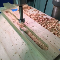 Forming the cavity which will house the timing belt and pulleys.
