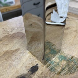 After some trial and error, the bar was highly polished