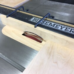 Cutting rabbets and grooves in carcass members with a stacked dado blade and sacrificial fence