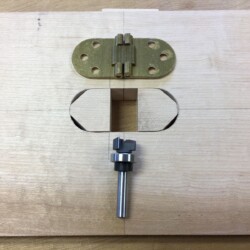 Removable inserts allow for using the same jig to cut clearance for the hinge knuckles