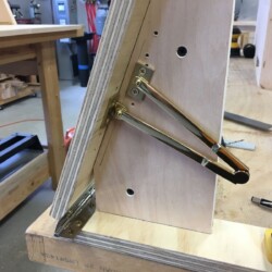 Once the final mounting locations were established with the test setup, those locations were transferred to the drop front and upper case