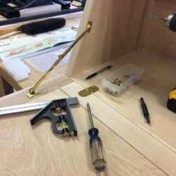 The drop front supports bridge the drop front joints that would have taken all of the stress when the drop front was in use