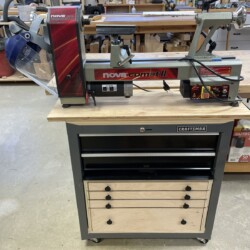 Completed lathe cabinet with lots of drawer storage to organize small accessories and supplies
