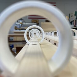 Using rings cut from 1-1/2 PVC pipe was an idea inspired by a wire management video on YouTube