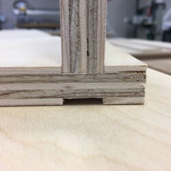 Shallow dadoes will register the vertical dividers.