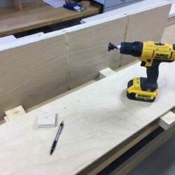 Predrilling and countersinking for screws to be used in assembly.