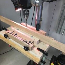 Deep counterbores for screws to help attach border pieces to the top.