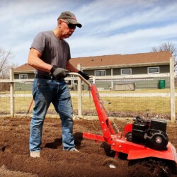 Tilling in this season's compost and fertilizer for the promise of another good harvest all growing season long