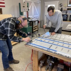 Kyle stopped by the shop to lend Lucas and Emily a hand
