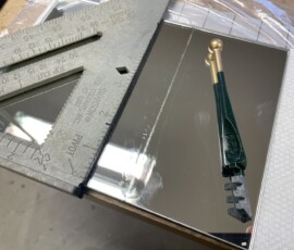 Scoring the mirror glass