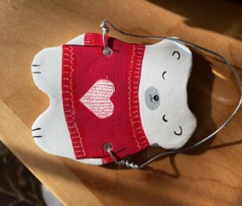 This hand-painted ornament is special in its own right