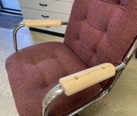 The new armrests were attached and awaiting plugs for the holes