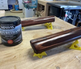 MinWax water-based, oil-modified polyurethane goes on with almost no odor and dries very quickly
